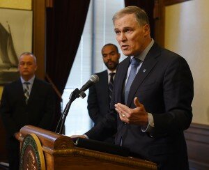 Washington Gov. Jay Inslee speaks during a news conference in Olympia, Wash., Tuesday, Dec. 22, 2015. More than 3,000 prisoners in Washington have been mistakenly released early since 2002 because of an error by the state's Department of Corrections. Inslee said he had ordered immediate steps to correct the long-standing problem. (Steve Bloom/The Olympian via AP) MANDATORY CREDIT